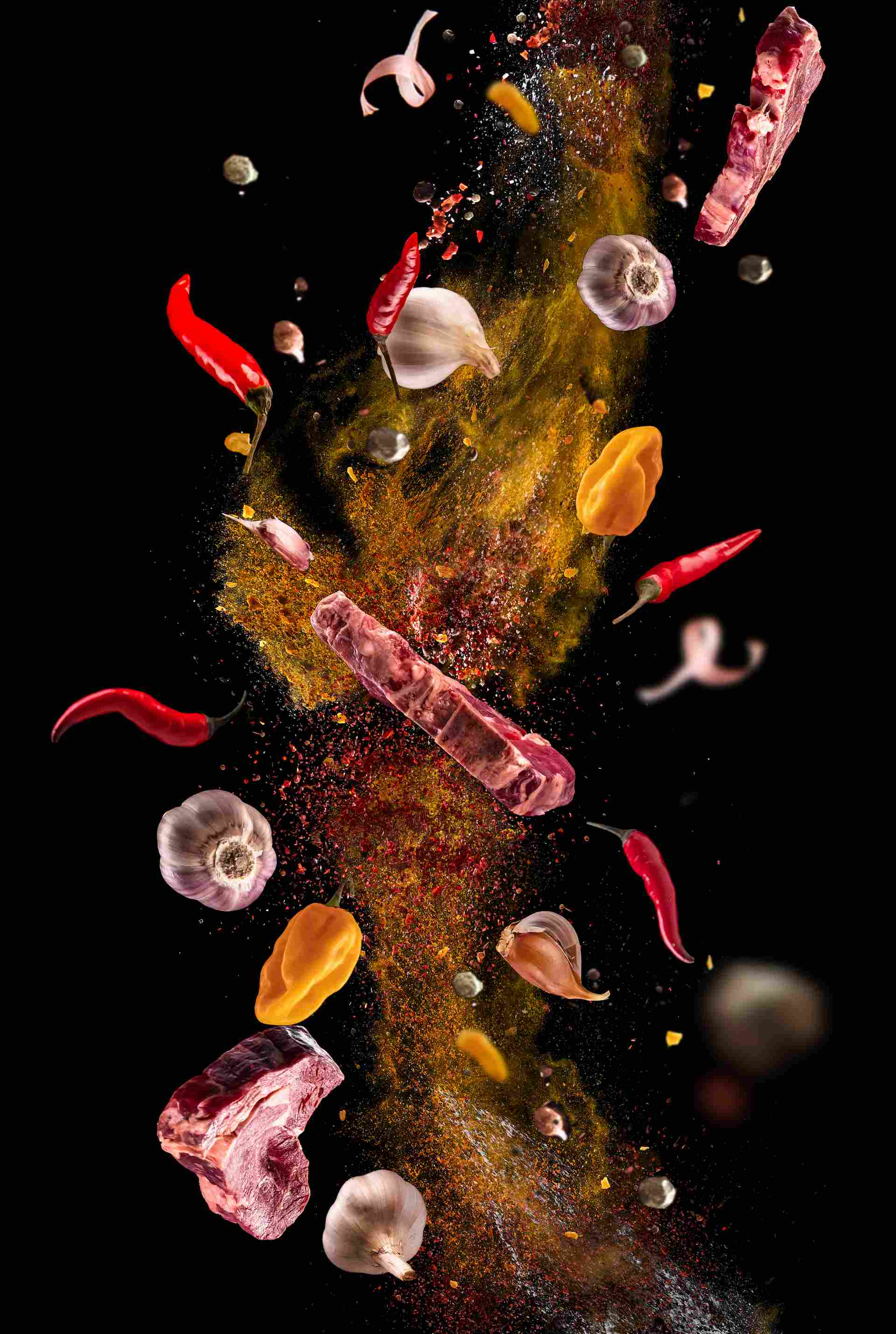 [Imagem de diferentes temperos e carnes voando]